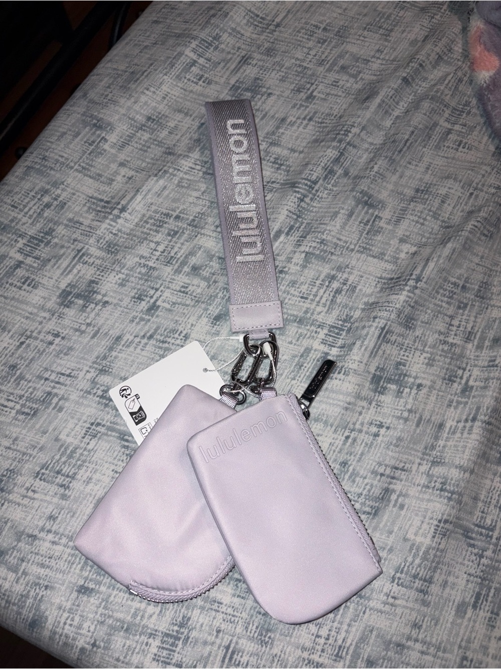 NWT rare color Lululemon dual pouch wristlet metallic wordmark